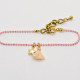 Rosa kleines Armband mit Sternchen und Baumwoll-Quaste