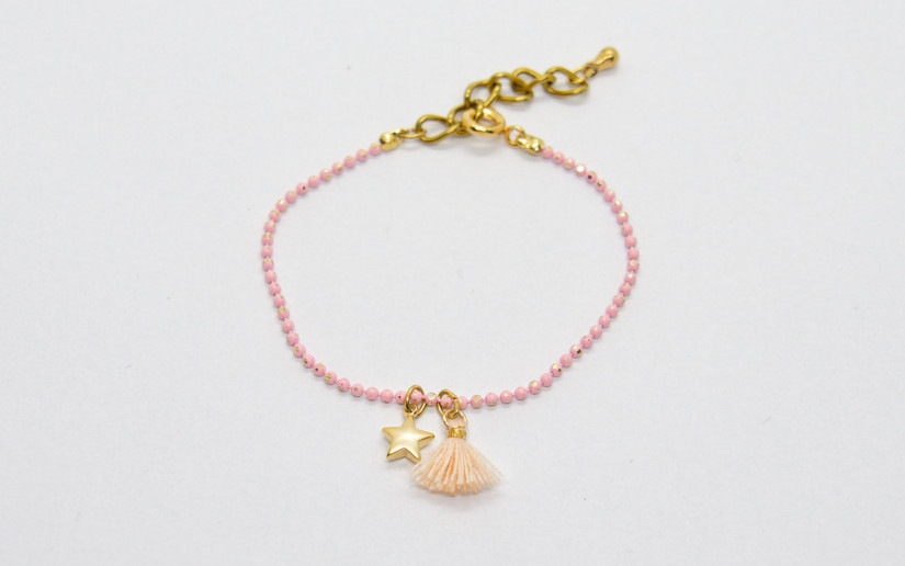 Rosa grosses Armband mit Sternchen und Baumwoll-Quaste