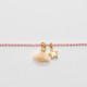 Rosa grosses Armband mit Sternchen und Baumwoll-Quaste